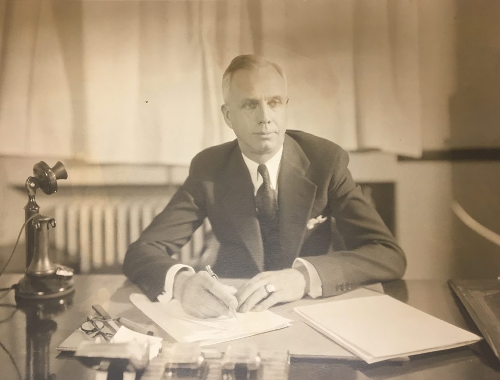 Albert M. Ewert at his desk at the Michigan State Prison, c. 1933 [Archives of Michigan]