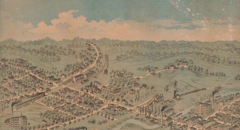 A section of an illustrated map of Jonesville. The city is shown from a birds eye perspective. There a roads, buildings, and a train on the map.