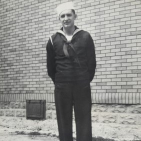 Man in uniform looking directly at camera